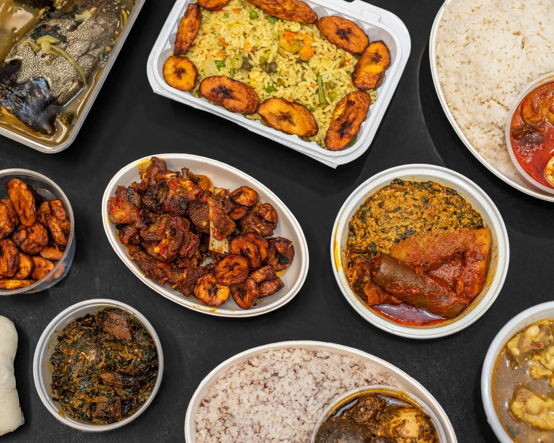 A spread of authentic Nigerian dishes from OddySamm's kitchen in Winnipeg